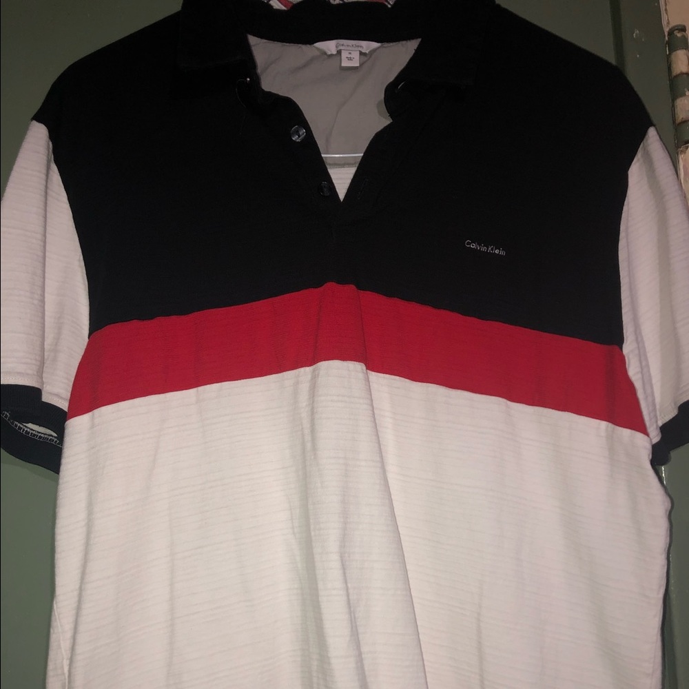Calvin Klein Polo Size: XL FITS LIKE A LARGE!